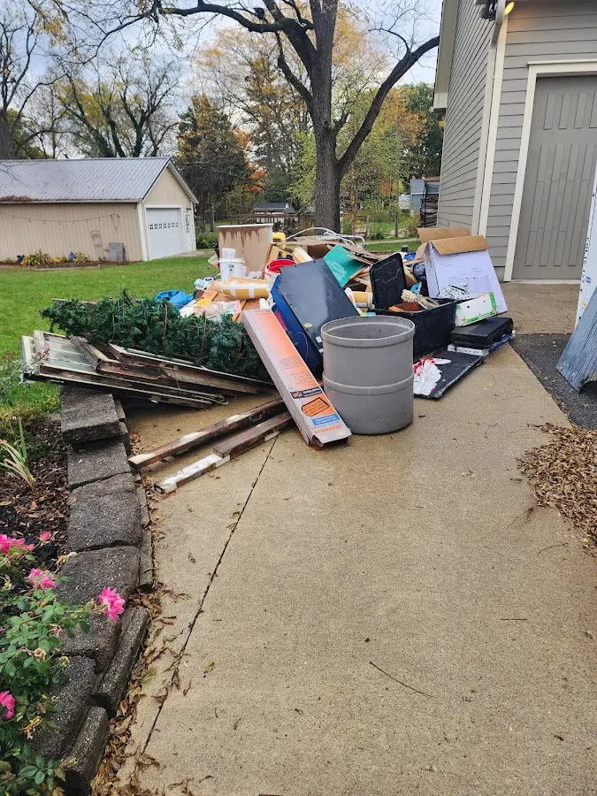 Dumpster being loaded with debris for Residential Dumpster Rental in Arcata
